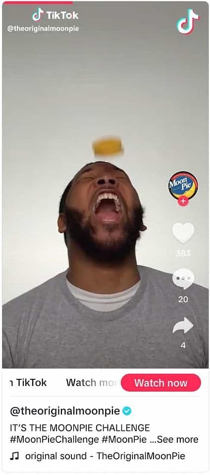 Image 10: TikTok video from MoonPie showing a person looking up with their mouth open trying to catch a moon pie