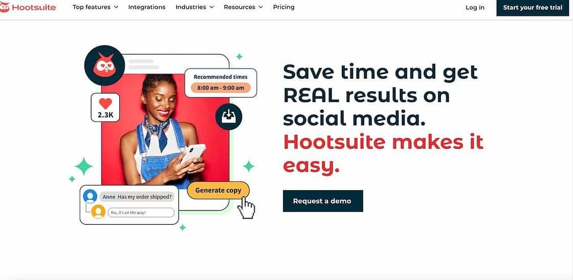 Image 16: Hootsuite homepage showing a woman smiling as she looks at her phone and the picture is overlayed with several bubbles highlighting the tools features, and the text reads save time and get REAL results on social media. Hootsuite makes it easy.